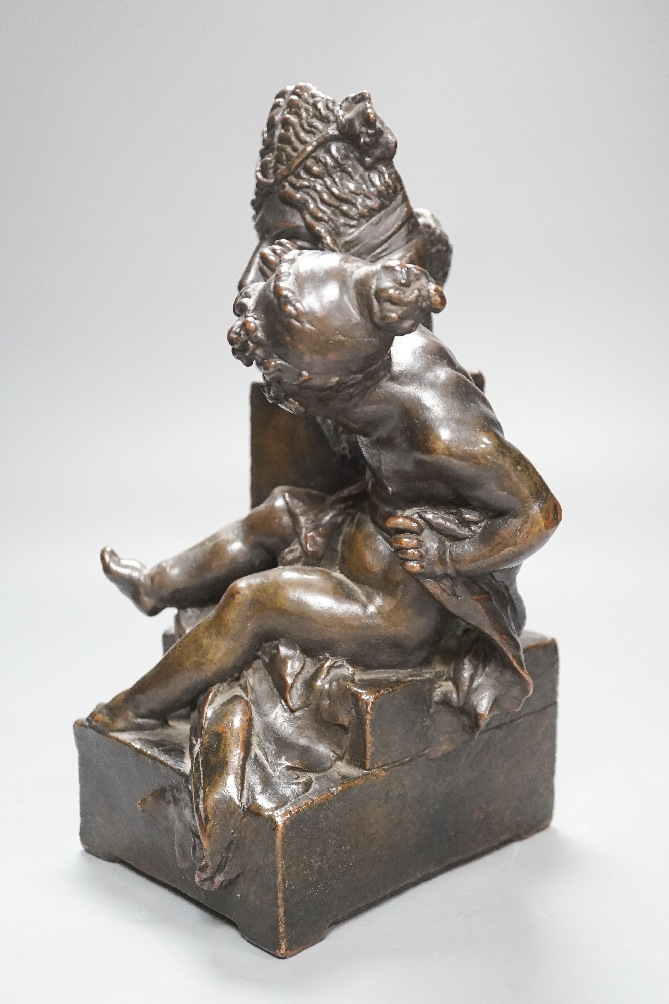 Gustave-Joseph Chéret (1838-1894). A bronzed terracotta group of putto beside a classical mask, signed, height 30cm